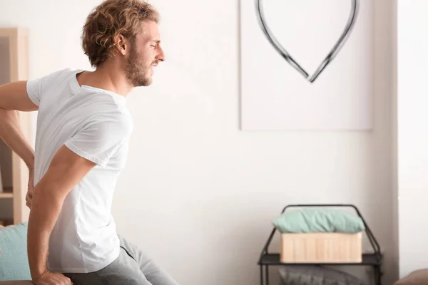 Young Man Suffering Back Pain Home — Stock Photo, Image