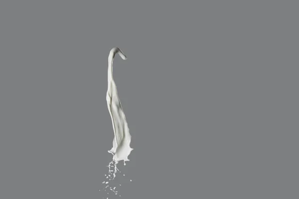 Spritzer Milch Auf Grauem Hintergrund — Stockfoto