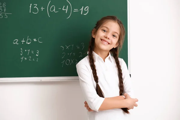 Cute Girl Standing Chalkboard Classroom — Stock Photo, Image