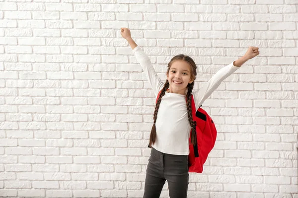 Happy Girl Backpack White Brick Background — Stock Photo, Image