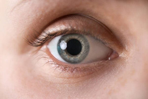 Young woman with beautiful eyes, closeup