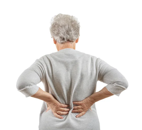 在白色背景上遭受背痛的老年妇女 — 图库照片