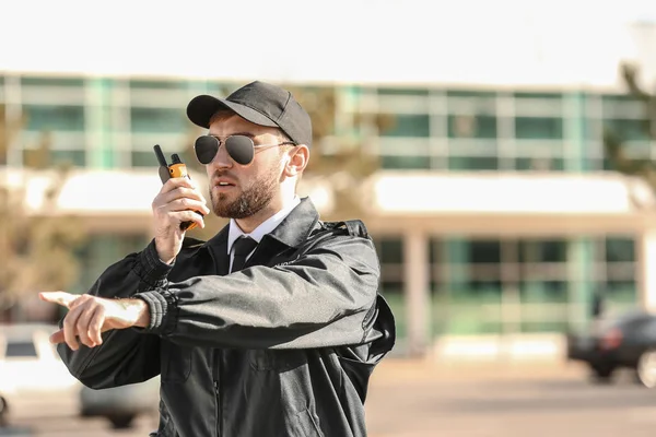 Male Security Guard Portable Radio Transmitter Outdoors — Stock Photo, Image