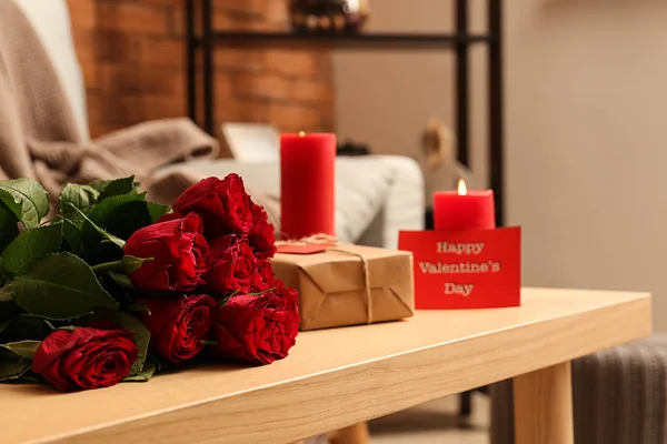 Red Roses Gift Burning Candles Wooden Table Valentines Day Celebration — Stock Photo, Image