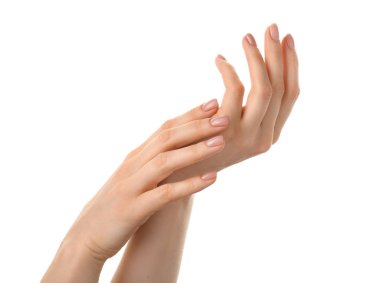Female hands with nude manicure on white background clipart