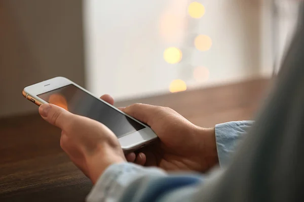 Woman Using Mobile Phone Wooden Table Closeup — Stock Photo, Image