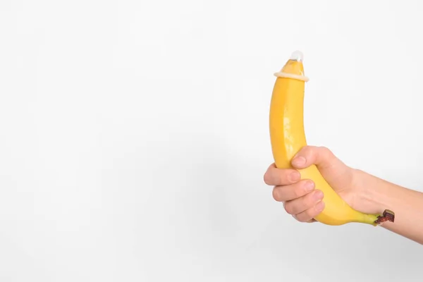Woman Holding Banana Condom Light Background Erotic Concept — Stock Photo, Image