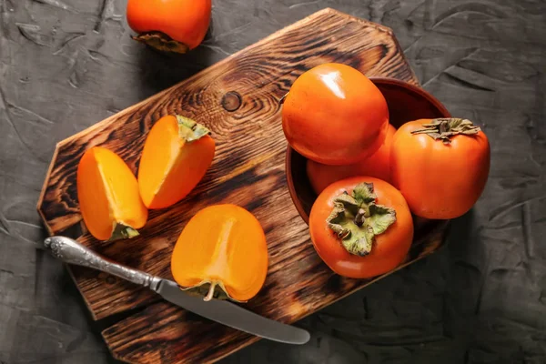 Ripe Persimmons Wooden Board Top View — Stock Photo, Image