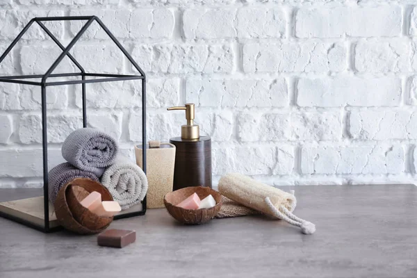 Soap Rolled Towels Grey Table Bathroom — Stock Photo, Image