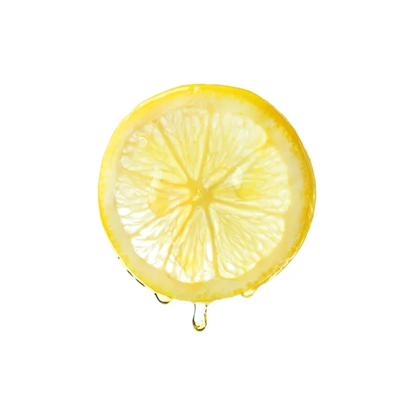 Ätherisches Tropft Von Zitronenscheibe Auf Weißem Hintergrund — Stockfoto