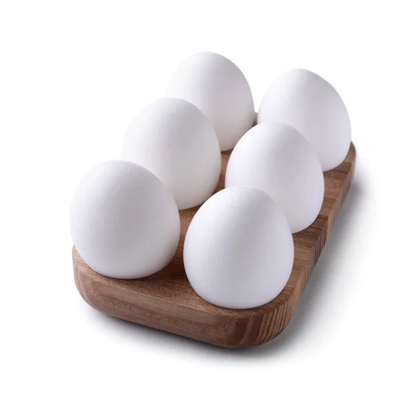 白地に鶏の卵を持つ木製のホルダー — ストック写真