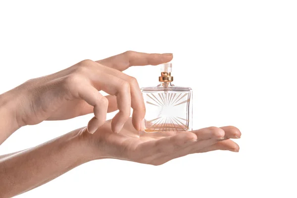 Beyaz Arka Plan Üzerinde Parfüm Şişe Tutan Kadın — Stok fotoğraf