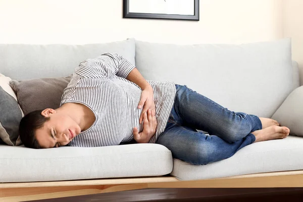 Young Man Suffering Abdominal Pain Home — Stock Photo, Image