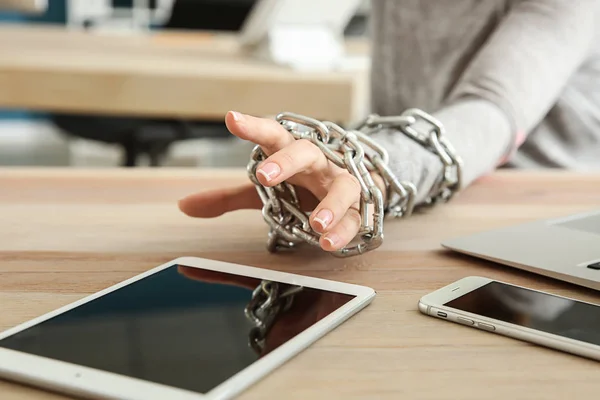 Woman Chained Hand Reaching Tablet Wooden Table Concept Addiction — Stock Photo, Image