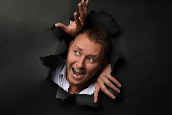 Frightened Man Tearing Dark Paper Panic Attack — Stock Photo, Image