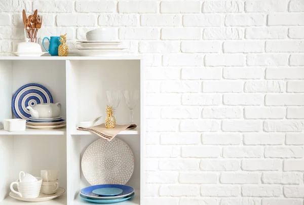 Set Clean Tableware Shelves White Brick Wall — Stock Photo, Image