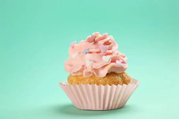 Leckere Cupcake Auf Farbigem Hintergrund — Stockfoto