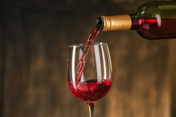 Pouring Red Wine Bottle Glass Dark Background — Stock Photo, Image