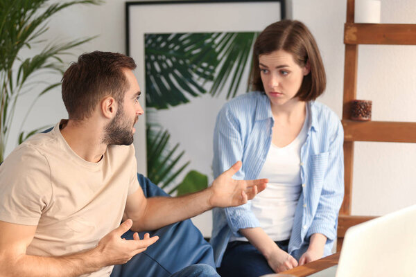 Young couple having arguments at home