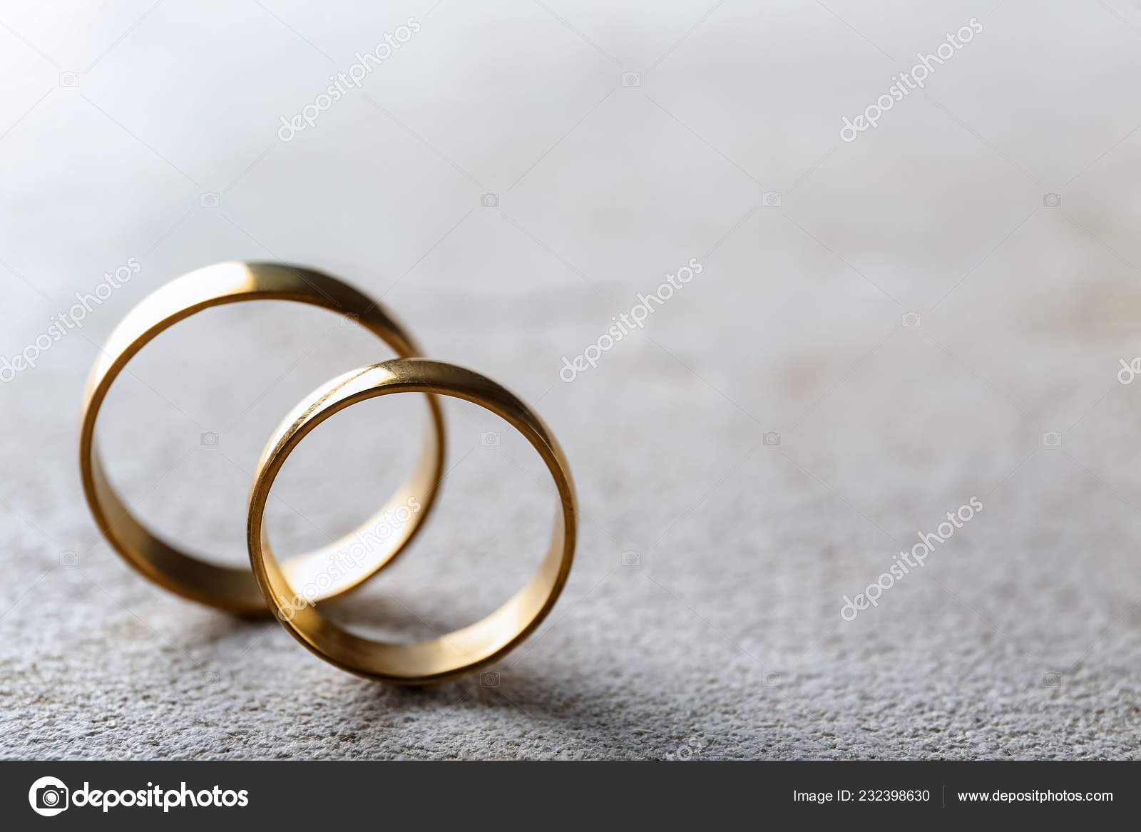 Wedding Rings Grey Background — Stock Photo © serezniy #232398630