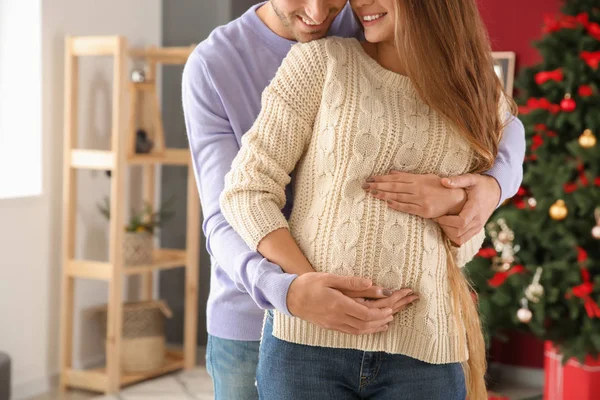 Young Pregnant Couple Home Christmas Eve — Stock Photo, Image