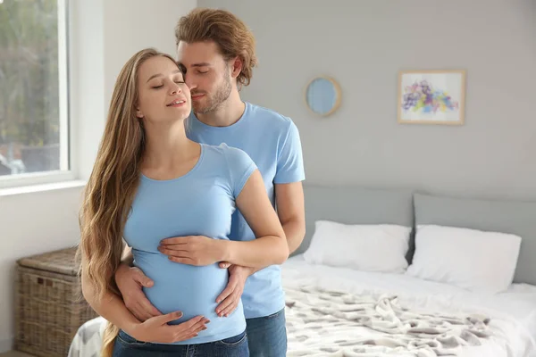 Young Pregnant Couple Home — Stock Photo, Image