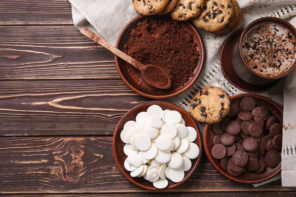 Different Chocolate Chips Powder Coffee Wooden Table — Stock Photo, Image