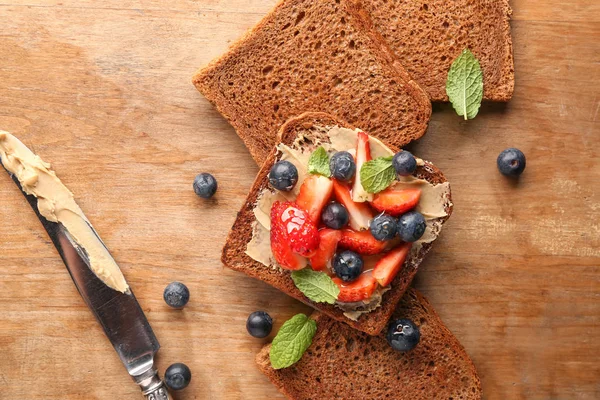 Tasty Toasted Bread Berries Wooden Table — Stock Photo, Image