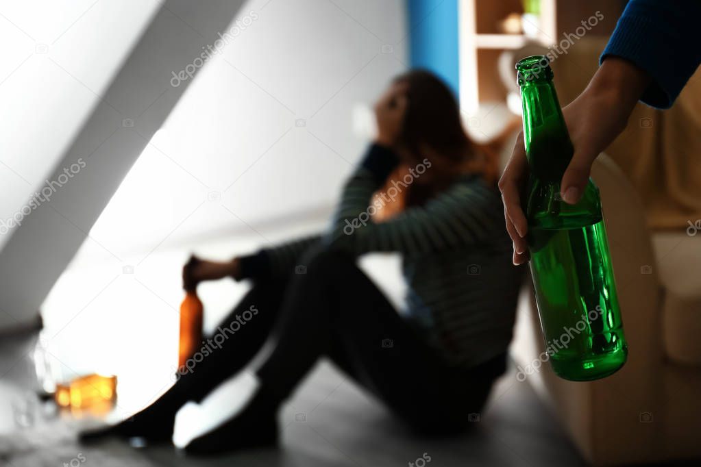 Women suffering from hangover after party at home. Concept of alcoholism