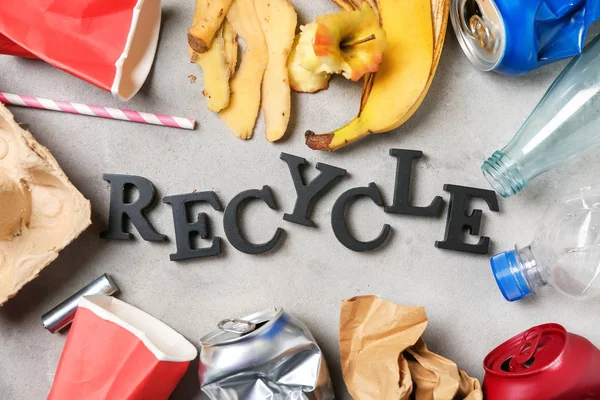 Word Recycle Different Garbage Grey Background — Stock Photo, Image