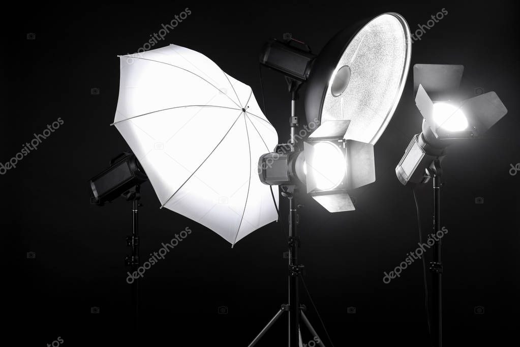 Professional lighting equipment on dark background