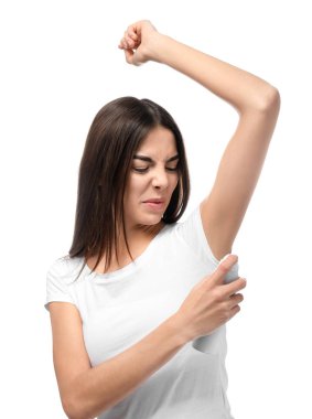 Güzel ve genç birbayan duygu beyaz arka plan üzerinde ter kokusu. Deodorant kullanmanın kavramı