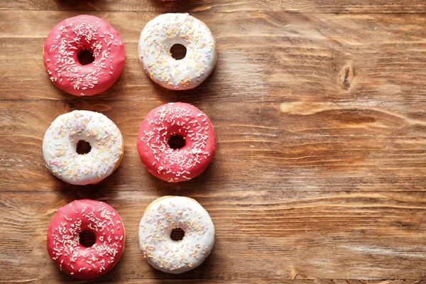 Donuts Saborosos Mesa Madeira — Fotografia de Stock