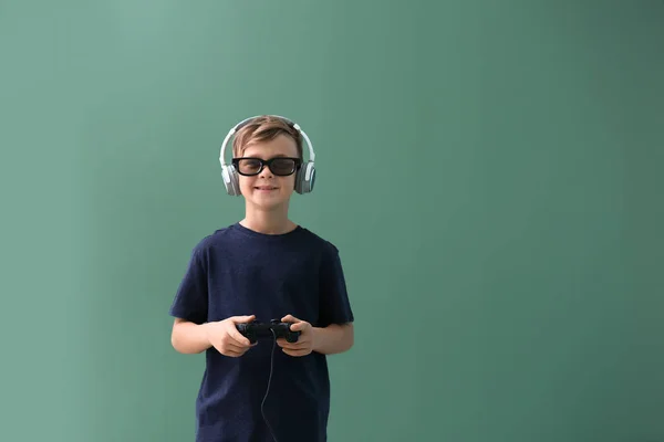 Cute Boy Playing Video Game Color Background — Stock Photo, Image