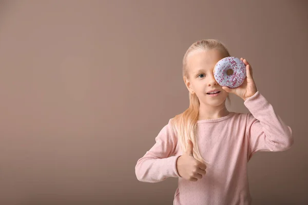 Cute Little Girl Donut Showing Thumb Color Background — Stock Photo, Image