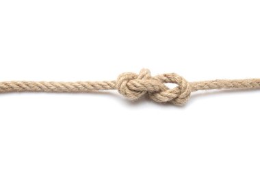 Beyaz arkaplanda düğüm olan ip
