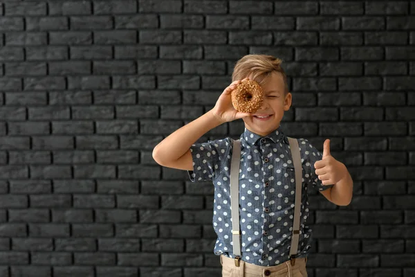 Cute Little Boy Donut Showing Thumb Dark Background — Stock Photo, Image