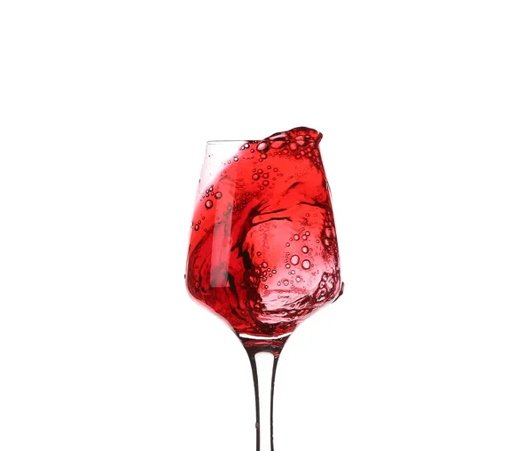 玻璃与红色飞溅酒在白色背景 — 图库照片
