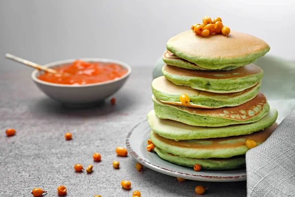 Tasty Green Pancakes Sea Buckthorn Grey Table — Stock Photo, Image