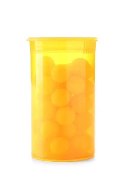 白い背景の上の黄色の錠剤容器 — ストック写真