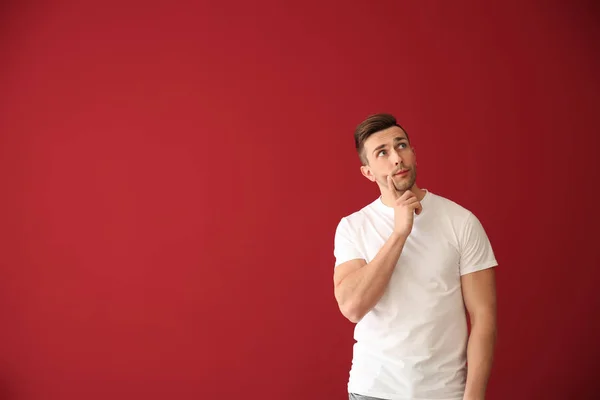 Thoughtful Young Man Color Background — Stock Photo, Image