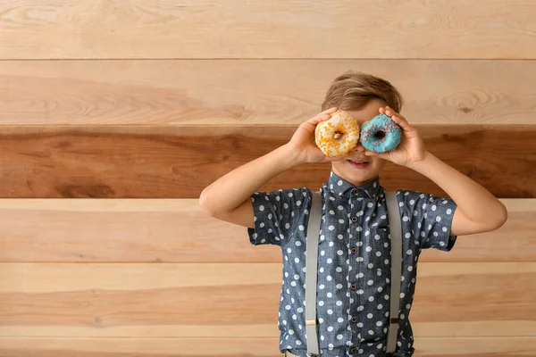 Cute Little Boy Donuts Wooden Background — Stock Photo, Image