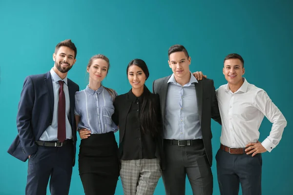 Team of young people on color background