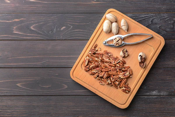 Wooden Board Nutcracker Pecan Nuts Table — Stock Photo, Image