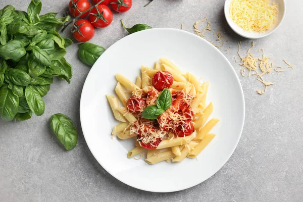 Plate Tasty Penne Pasta Grey Table — Stock Photo, Image