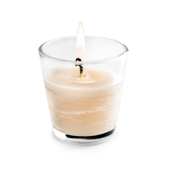 Burning candle on white background