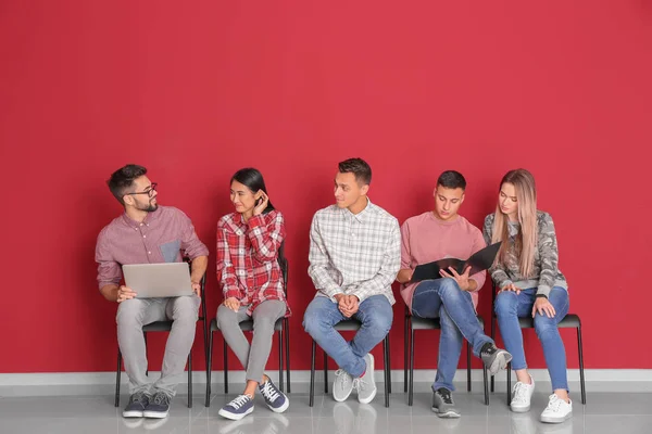 Young Students Sitting Color Wall — Stock Photo, Image
