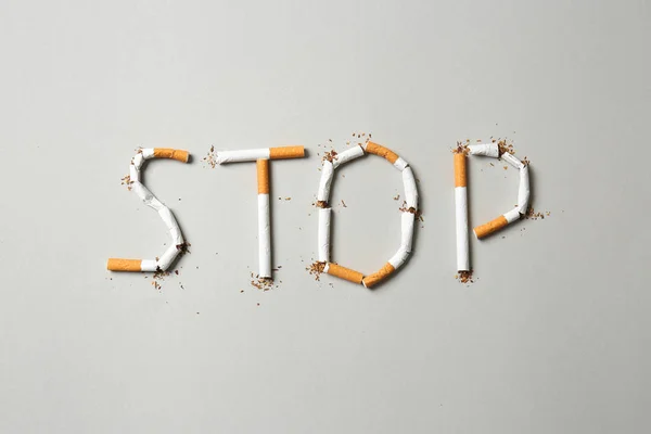 Word Stop Made Cigarettes Grey Background Concept Addiction — Stock Photo, Image