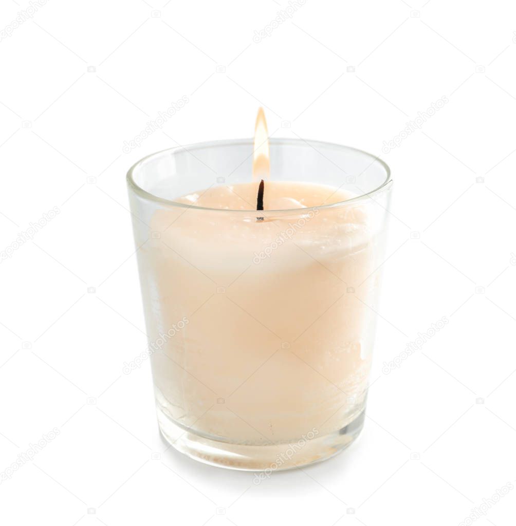 Burning candle on white background