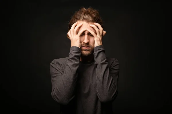 Young Man Suffering Headache Dark Background — Stock Photo, Image